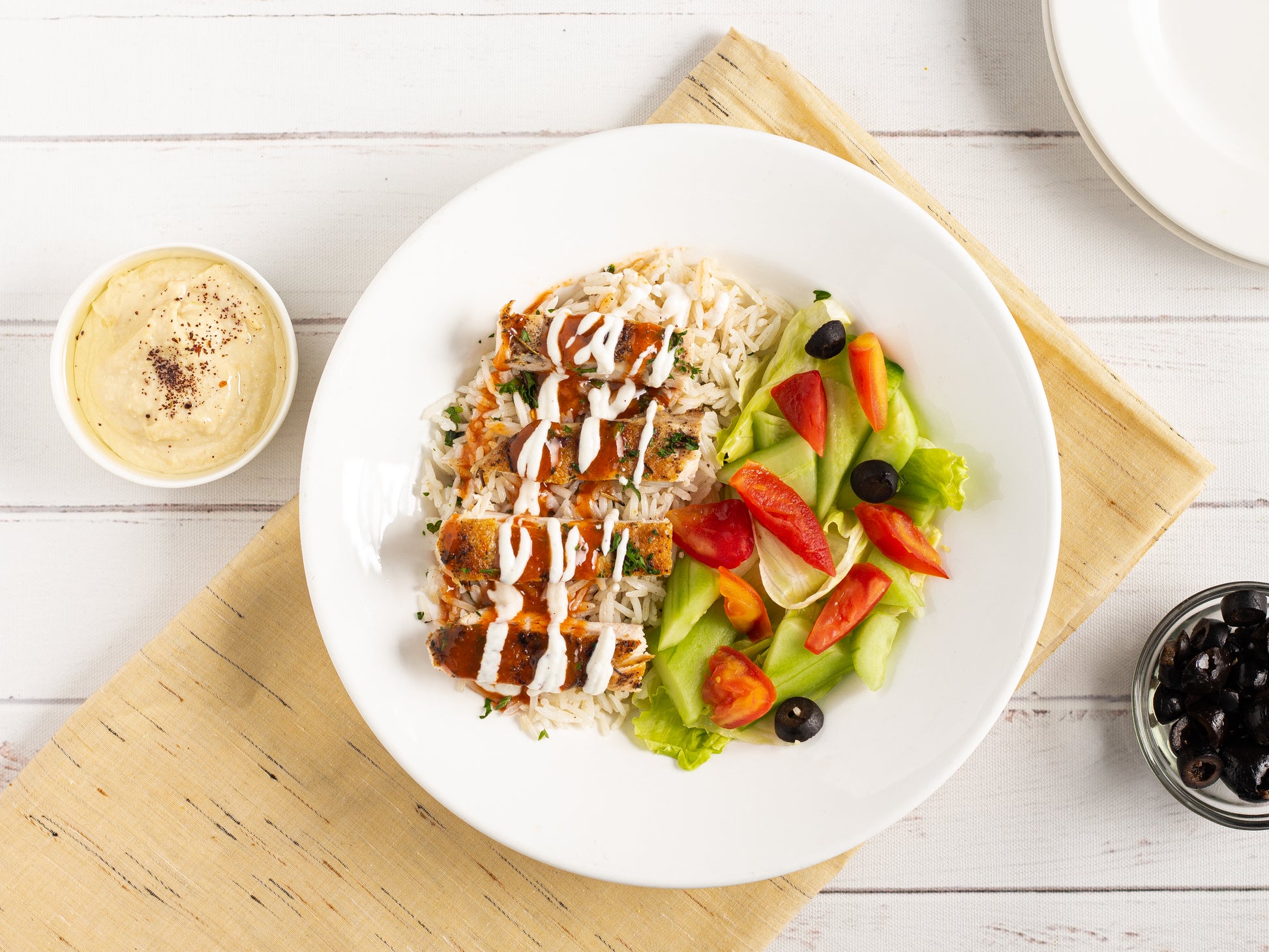 Grilled Chicken with Herb Rice and Hummus Image